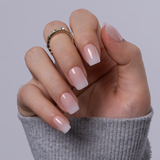 Nude Ombre short squoval press-on nails from the side
