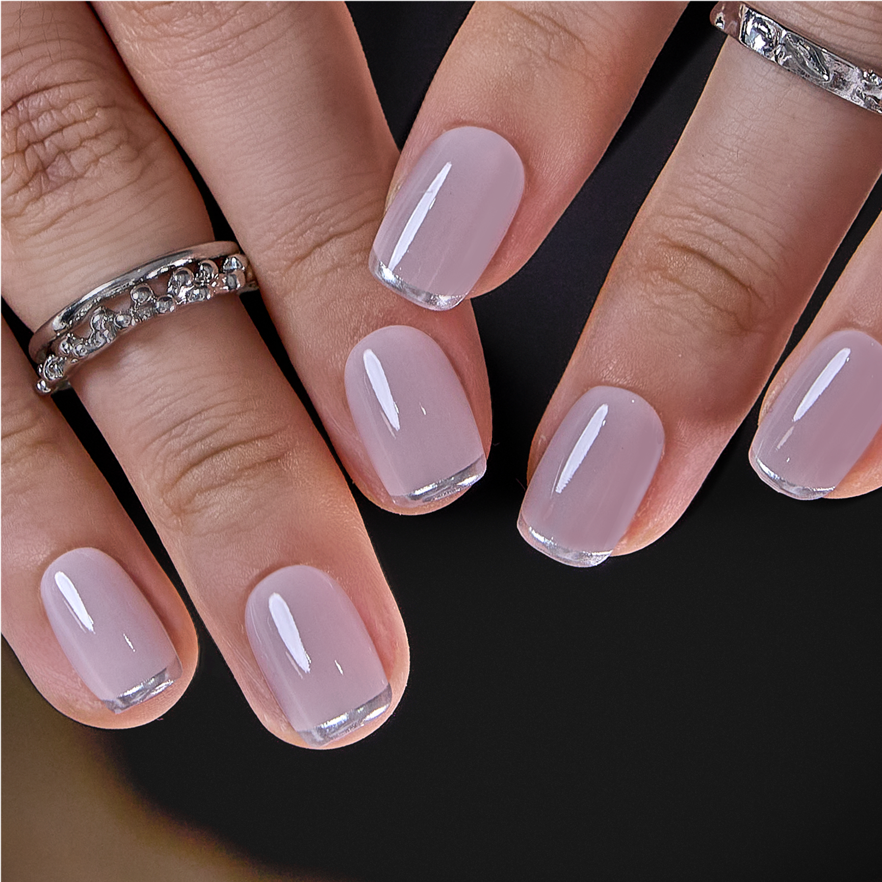 Nude Pink short squoval press-on nails from the side