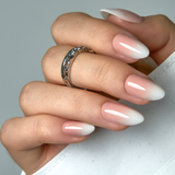 Nude Tips short almond nail detail