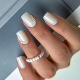 Pearl Drizzle short squoval press-on nails from the side