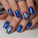Pearl Floral medium squoval press-on nails worn on a hand