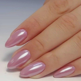 Pearl Orchid short almond press-on nails worn on a hand