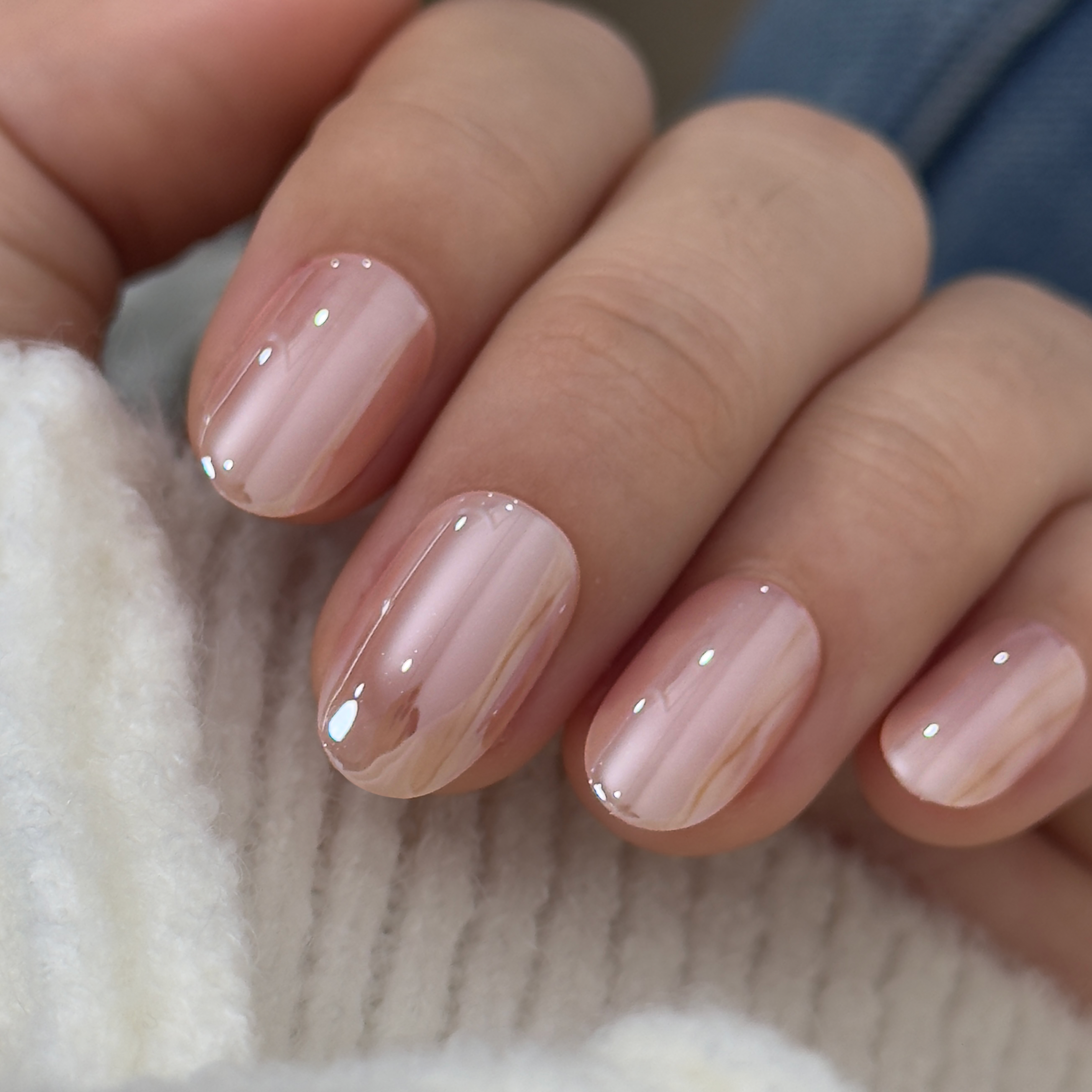 Pearl Pink Chic short oval press-on nails from the side