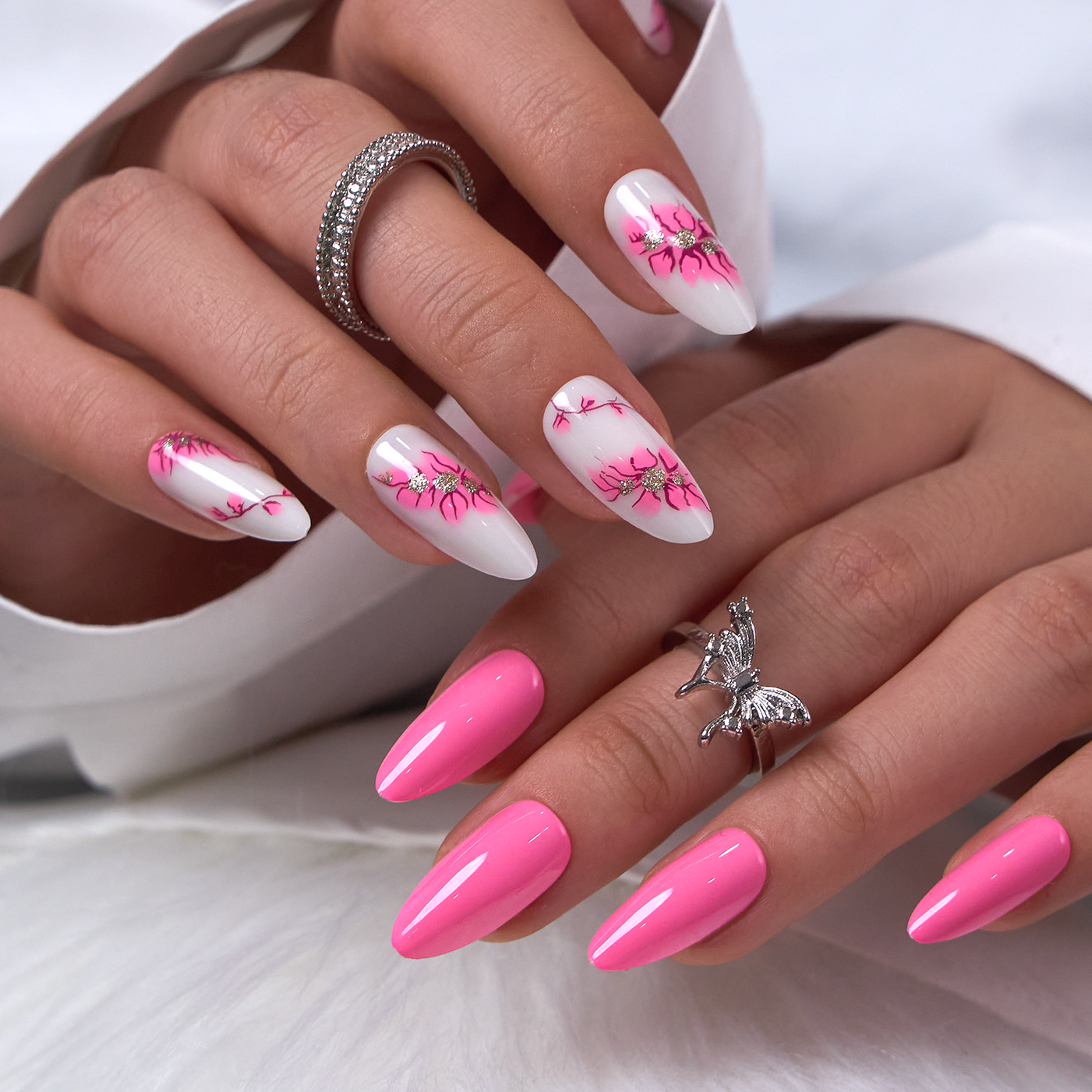Petal Muse L stiletto press-on nails worn on a hand