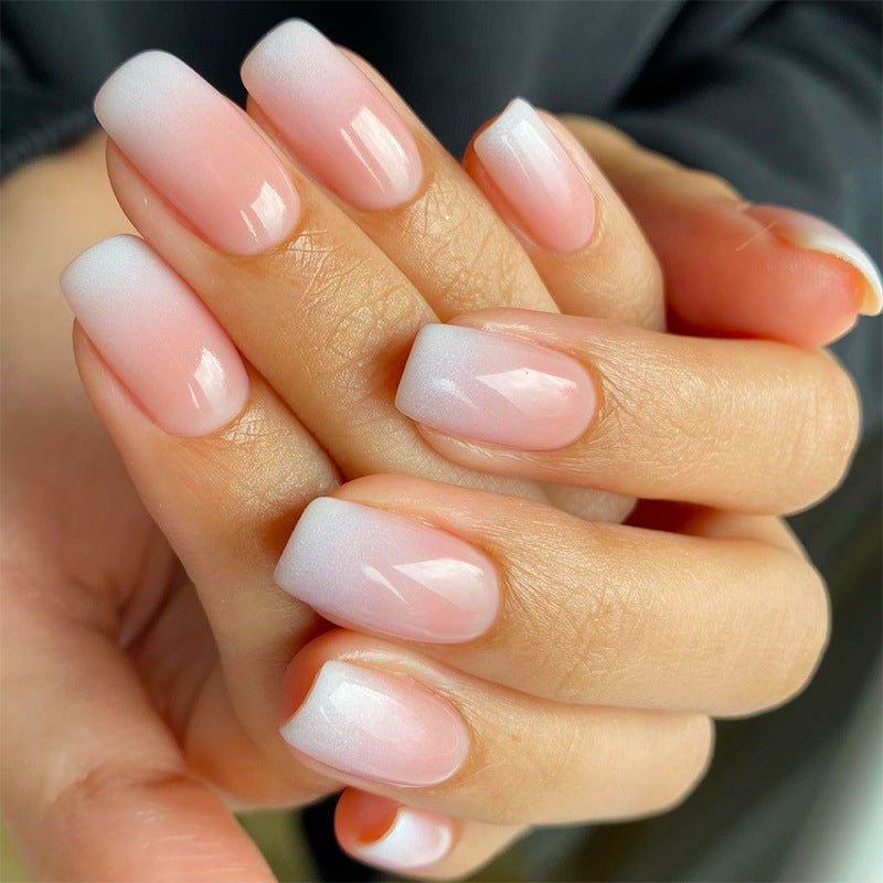 Pink Drift medium squoval press-on nails from the side