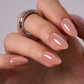 Pink Opal Gleam short almond press-on nails