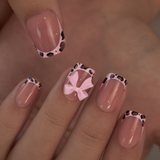 Pink Safari short squoval press-on nails from the side