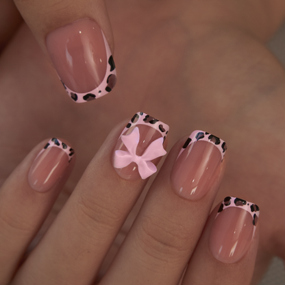 Pink Safari short squoval press-on nails from the side