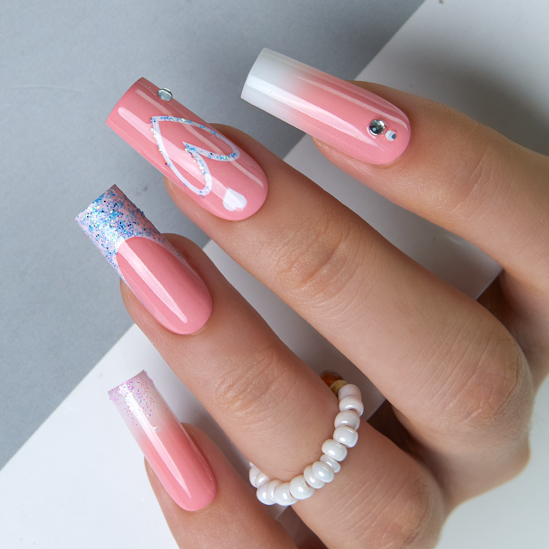 Pink Valentine long square nail detail