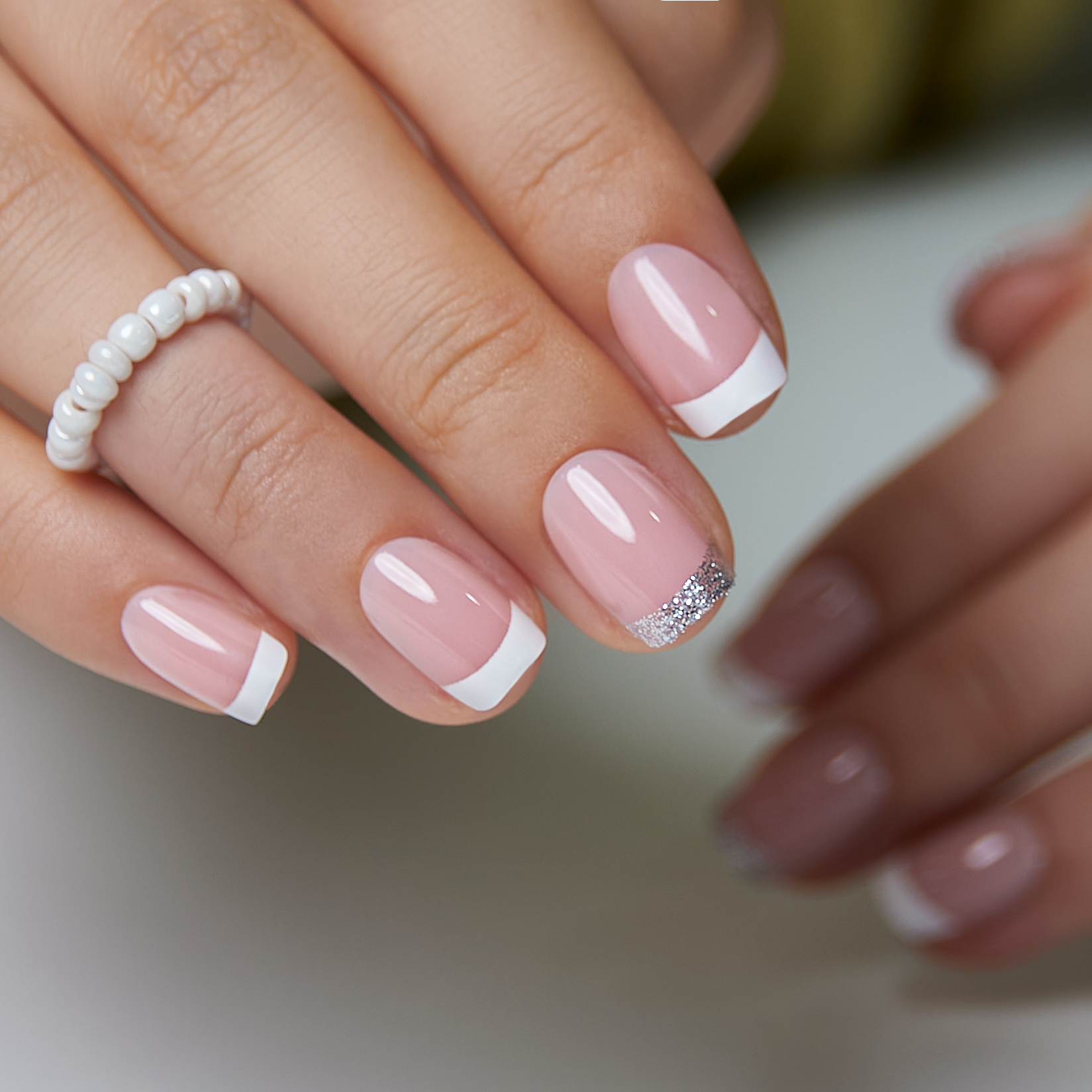 Sparkle French – short Squoval press-on nails packaging
