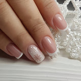 Snowy Grace – medium Squoval nail detail