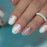 Snowflake Luxe – short Oval press-on nails packaging