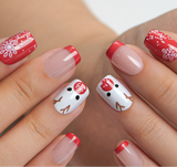 Reindeer Snowdrift short squoval press-on nails worn on a hand