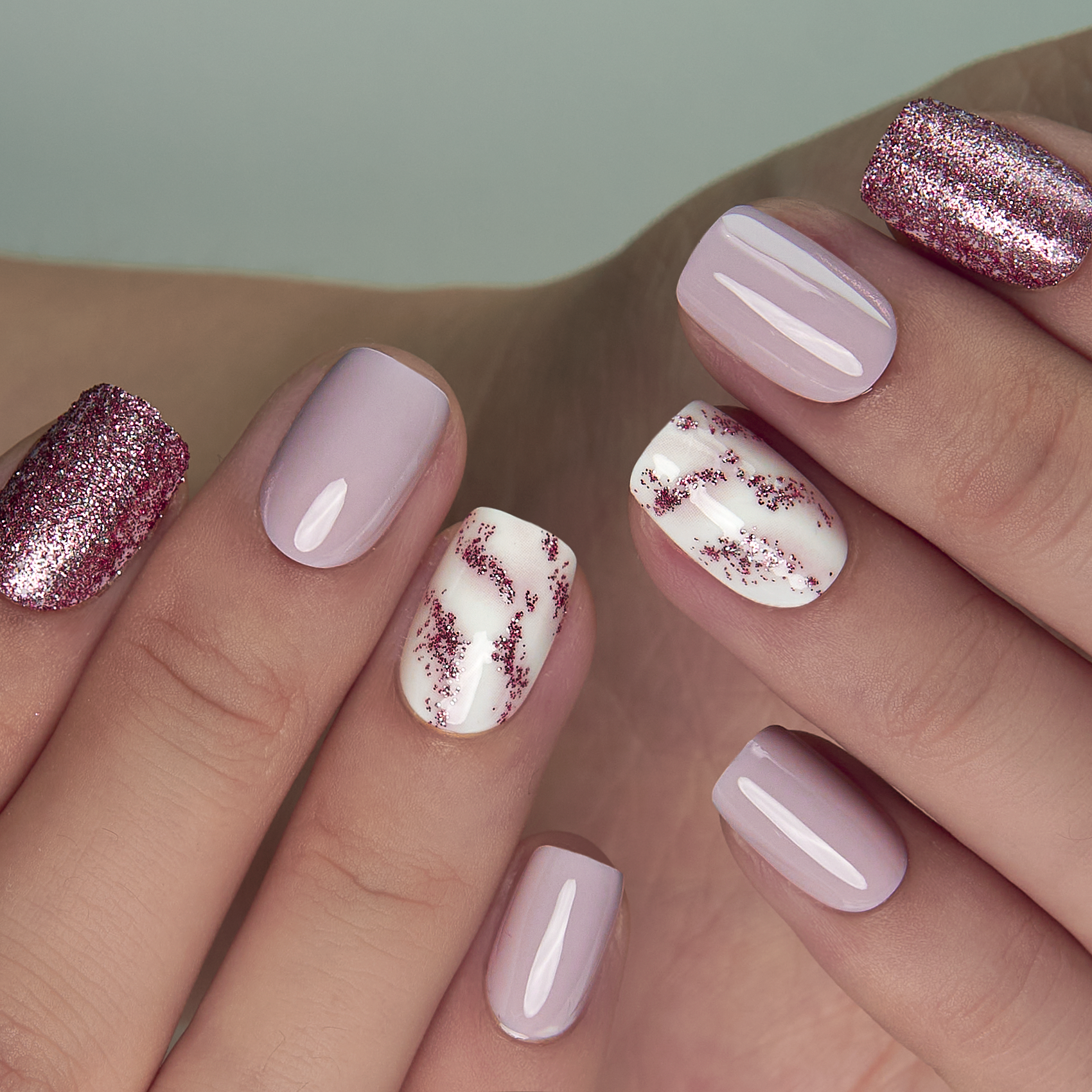 Rose Glint short squoval press-on nails from the side