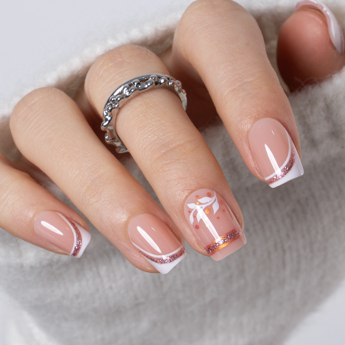Rose Gold short squoval press-on nails from the side