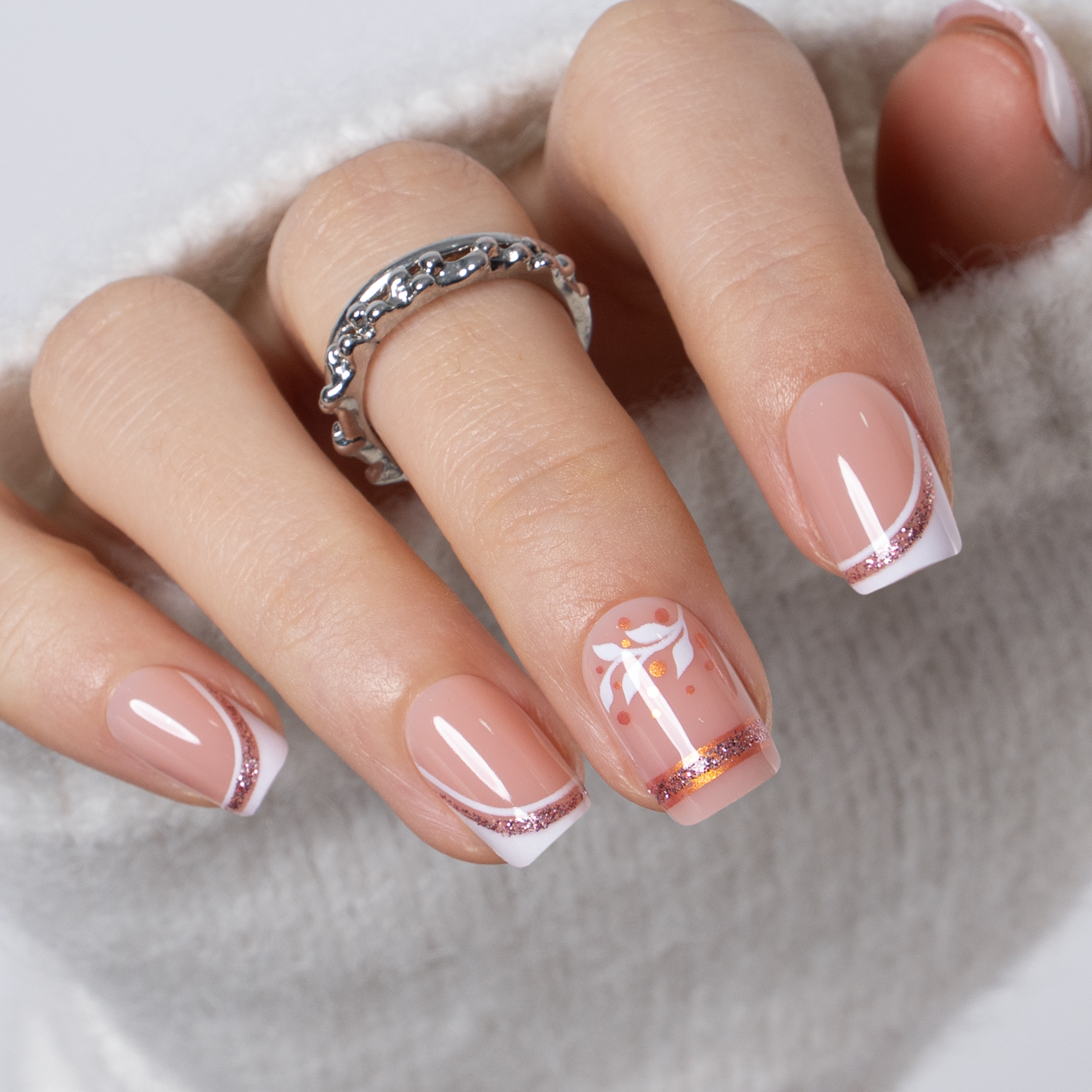 Rose Gold short squoval press-on nails from the side
