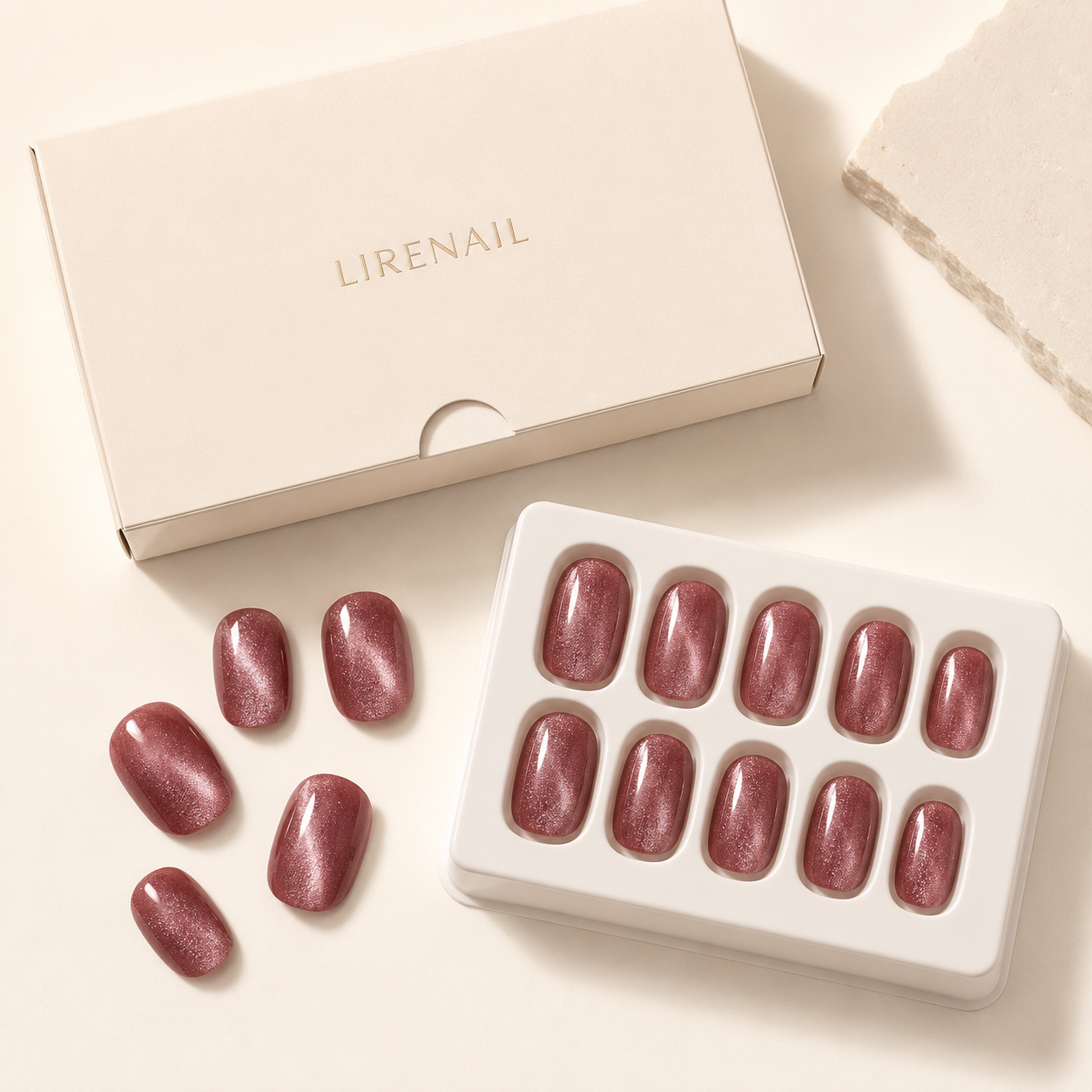 Rose Shimmer Cat Eye short oval press-on nails from the side
