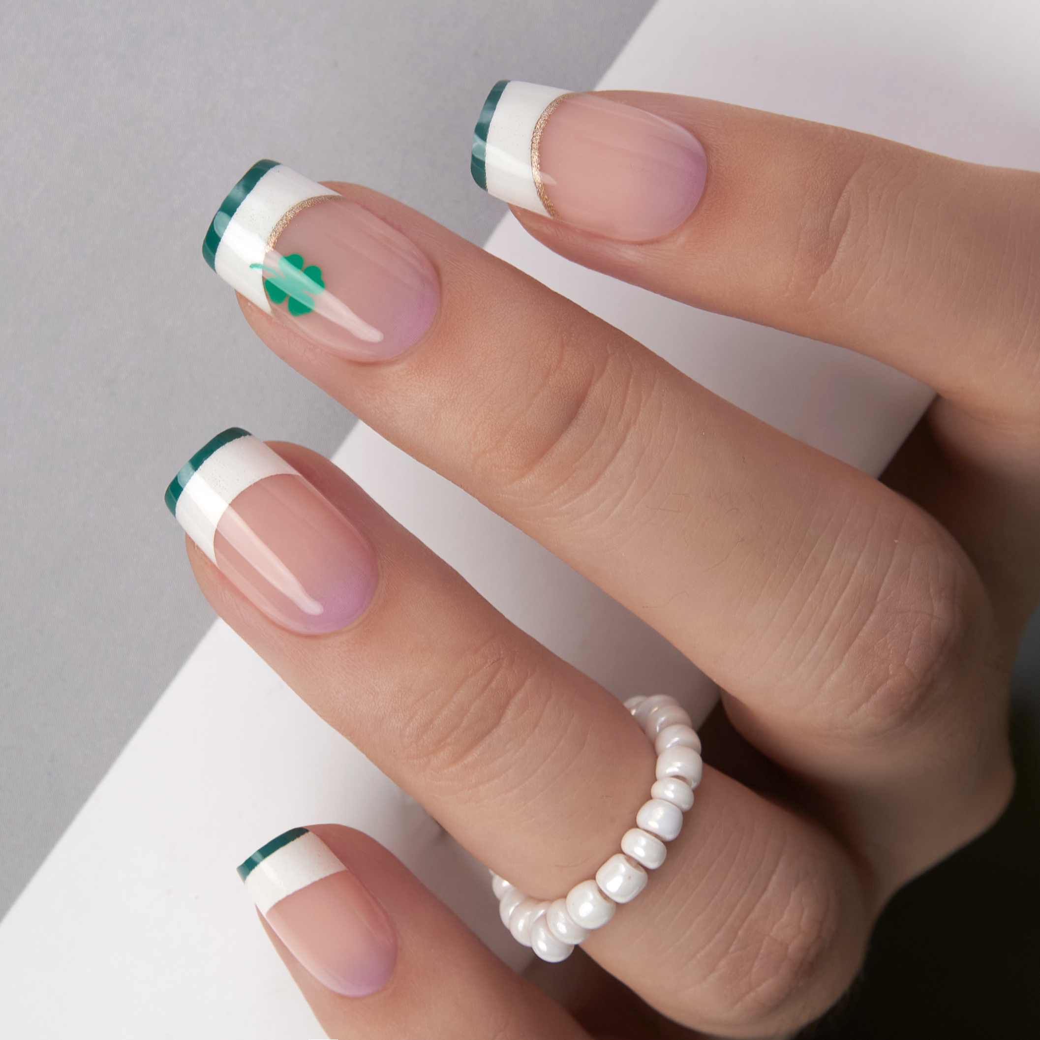 Shimmer Clover medium squoval nail detail