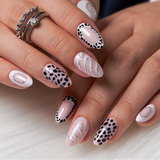 Silver Line Chic short almond press-on nails worn on a hand