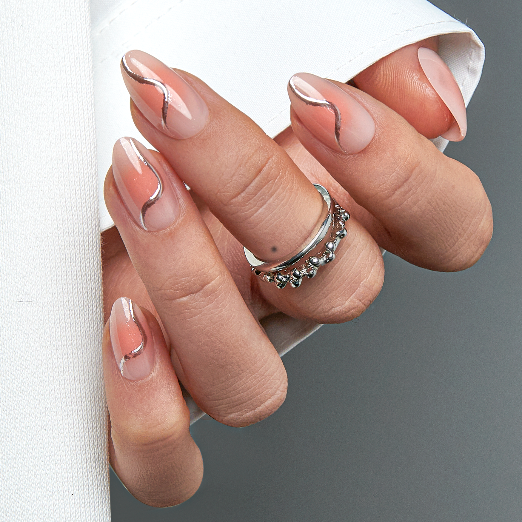 Silver Wave short almond nail detail
