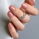Simple Cute Rs squoval press-on nails worn on a hand