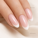 Soft French medium almond press-on nails worn on a hand
