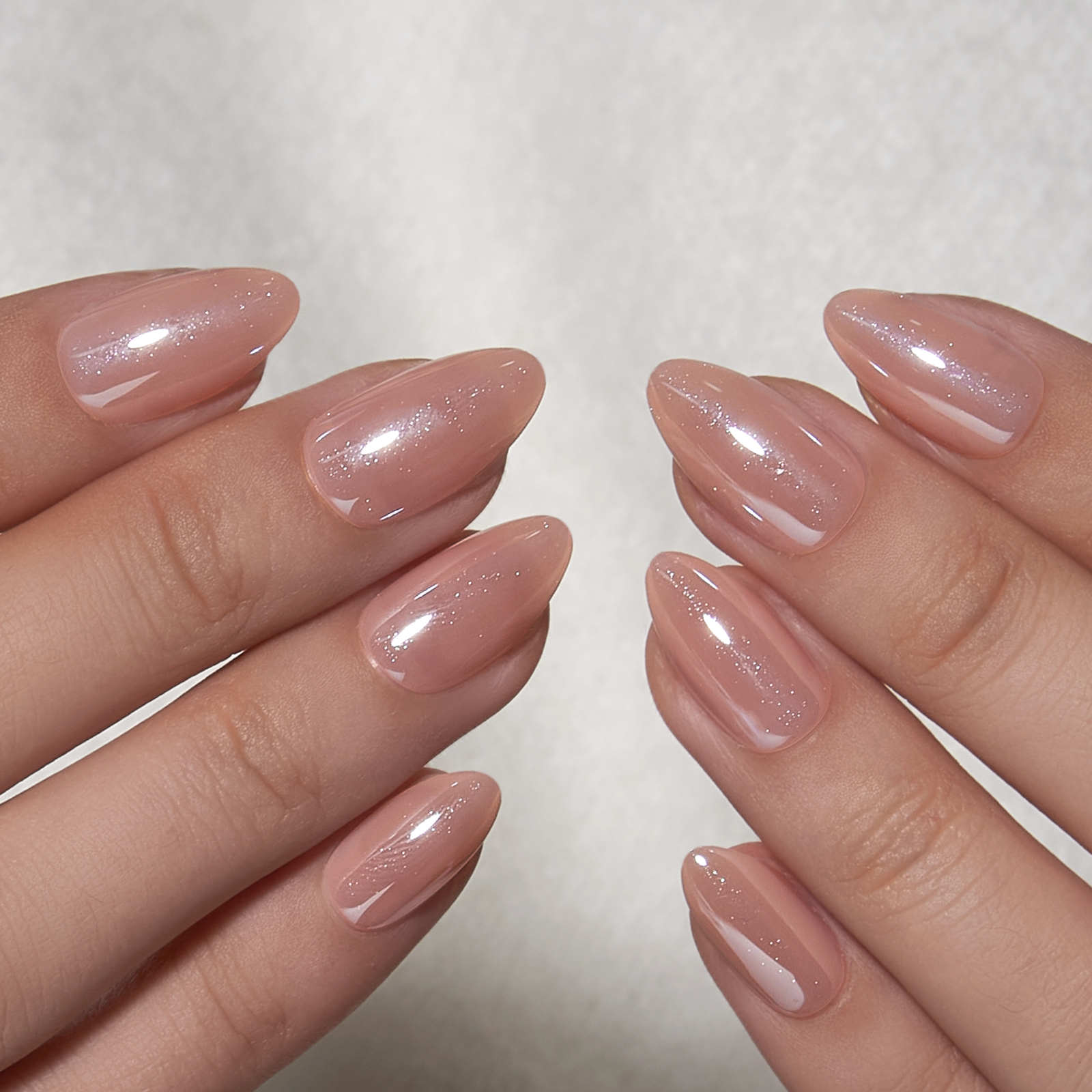 Soft Nude Charm short almond nail detail