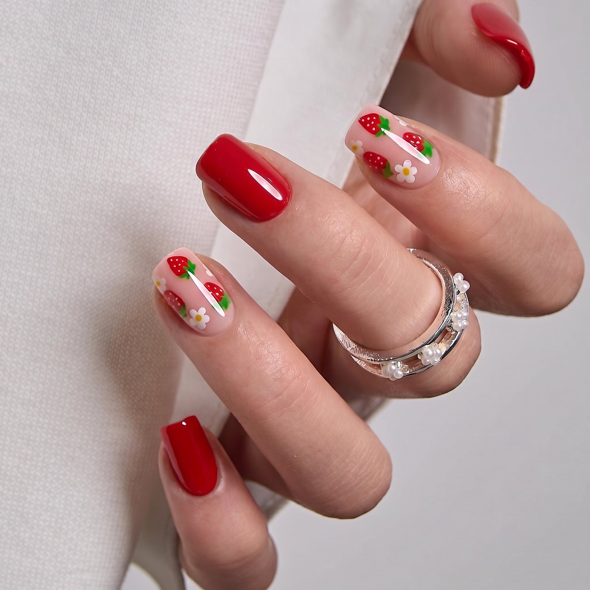 Strawberry Kiss medium square press-on nails from the side
