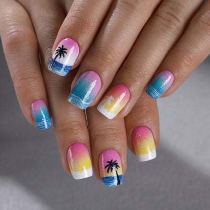 Summer Beach short squoval press-on nails worn on a hand