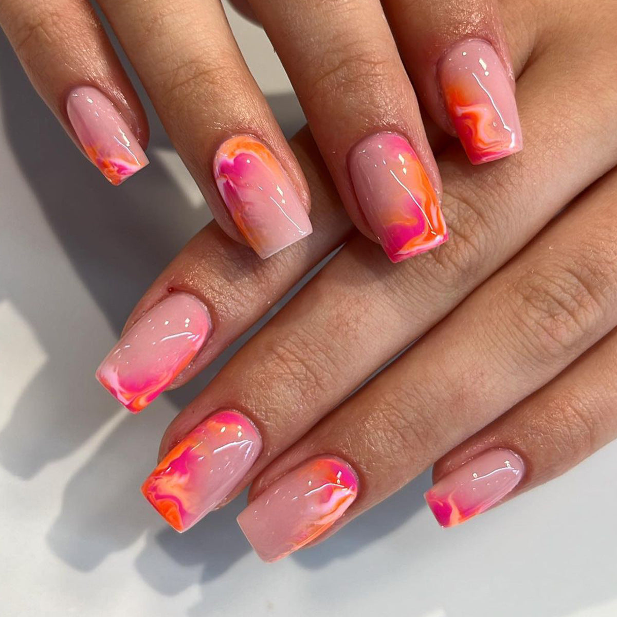 Sunset Blush short squoval press-on nails from the side