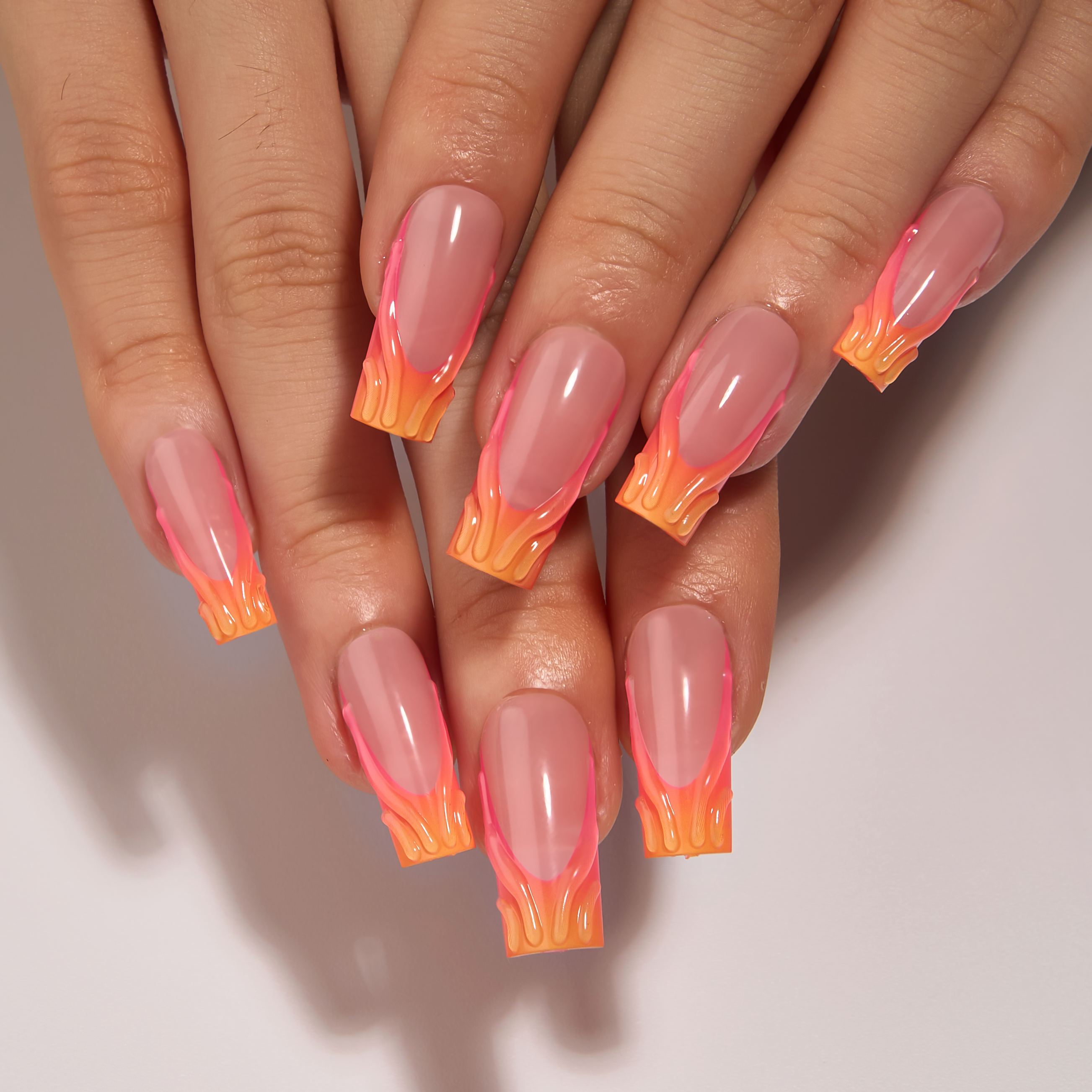 Sunset Ember long square press-on nails from the side