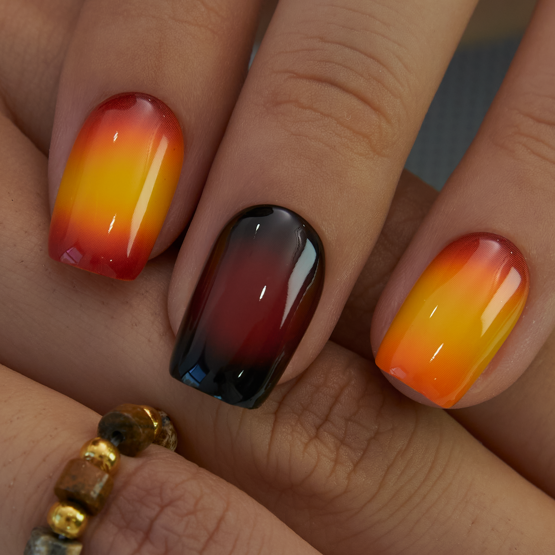 Sunset Flame medium squoval nail detail
