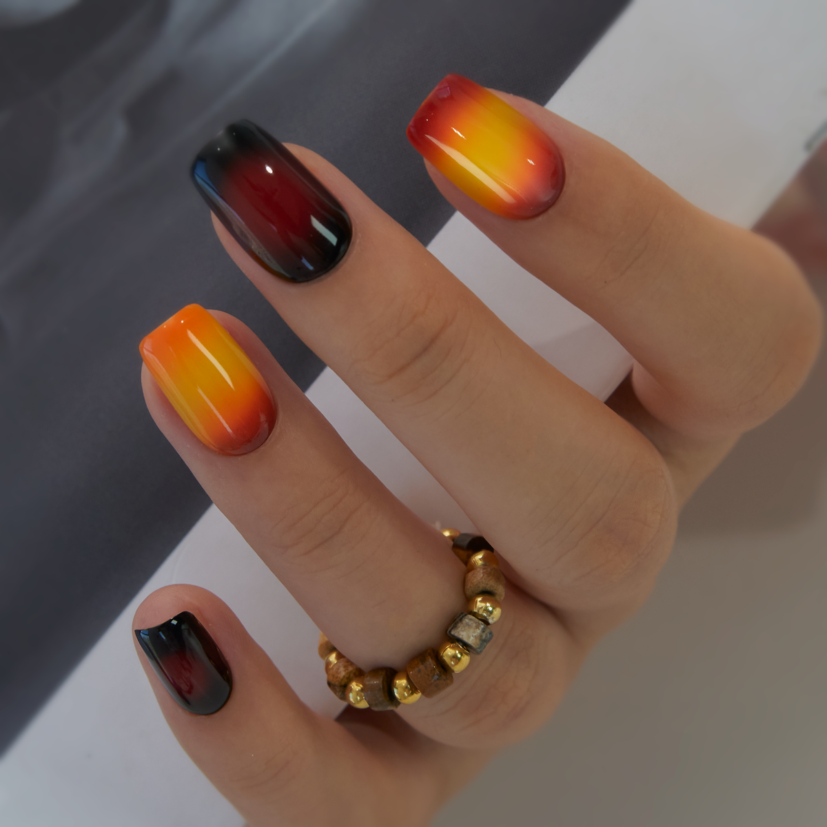 Sunset Flame medium squoval press-on nails from the side