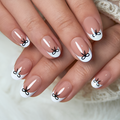 Sweet Knot short oval press-on nails