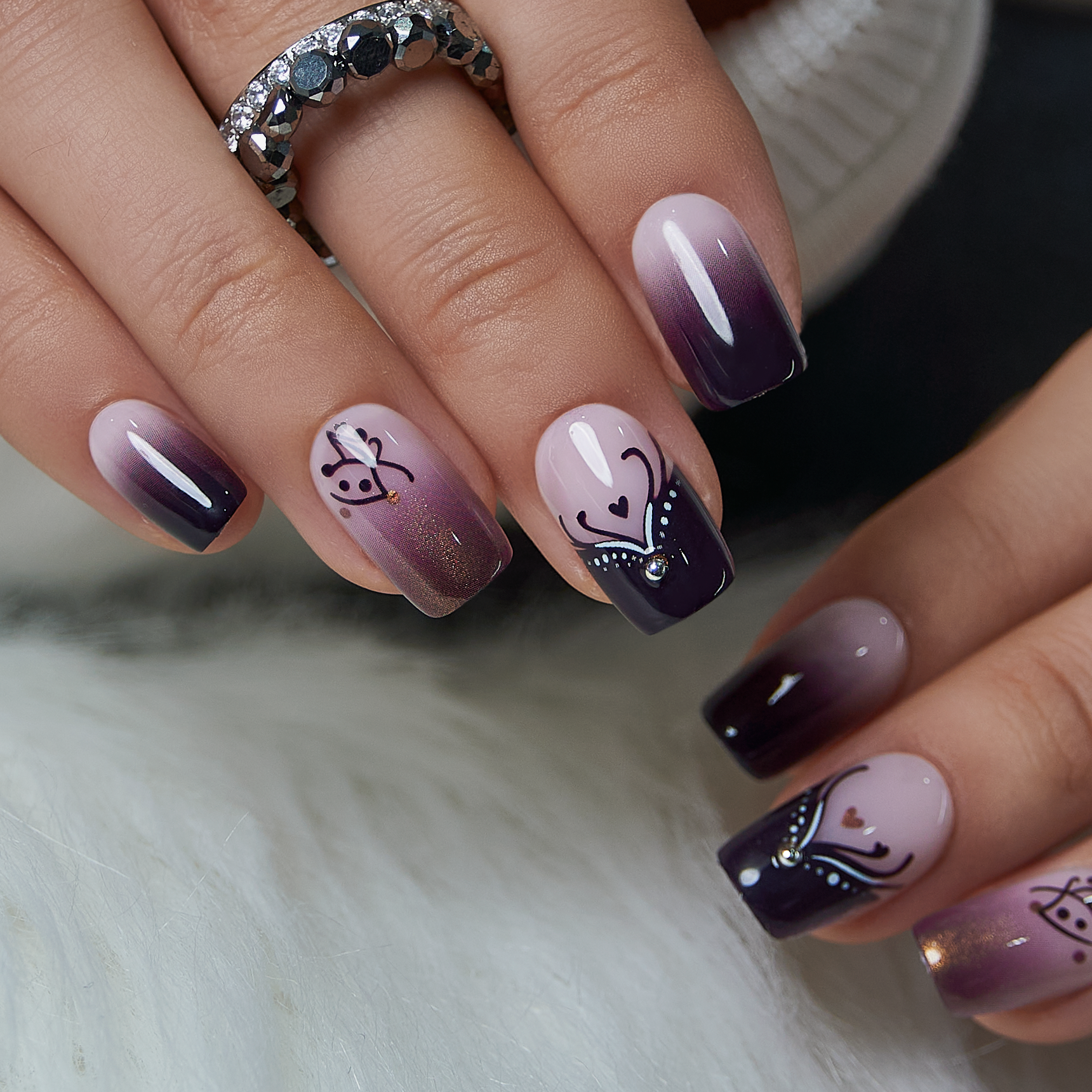 Sweet Pearl medium squoval press-on nails worn on a hand