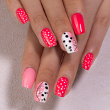 Sweet Pop Dream medium squoval press-on nails worn on a hand