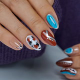 Wild Western short almond press-on nails worn on a hand